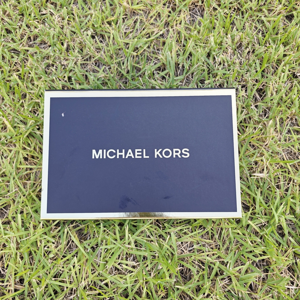 Michael Kors Black and White Display Sign